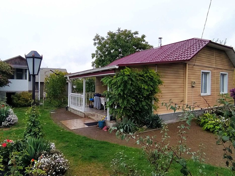 Будинок з земельною ділянкою 21 сотка