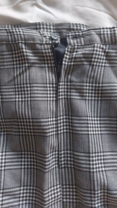 Saia xadrez preta e branca