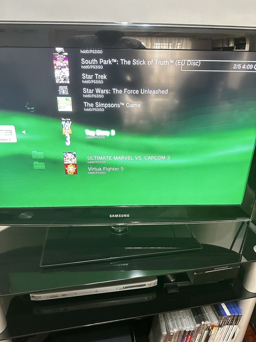 PS3 with custom firmware and multiple games64298077337474123