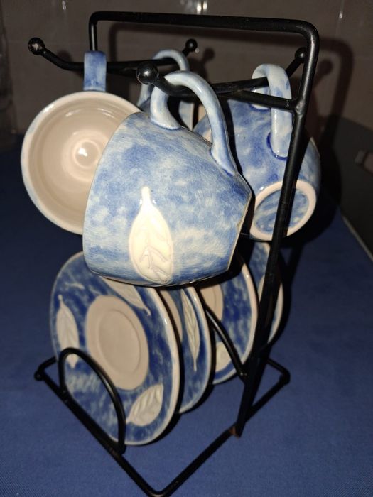 Chávenas de café com prato