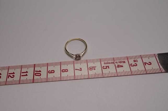 Apart złoty pierścionek z diamentem brylant 0,21 ct.