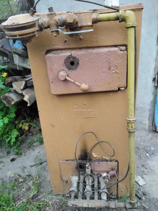 Продам твердотопливный - газовый котел.