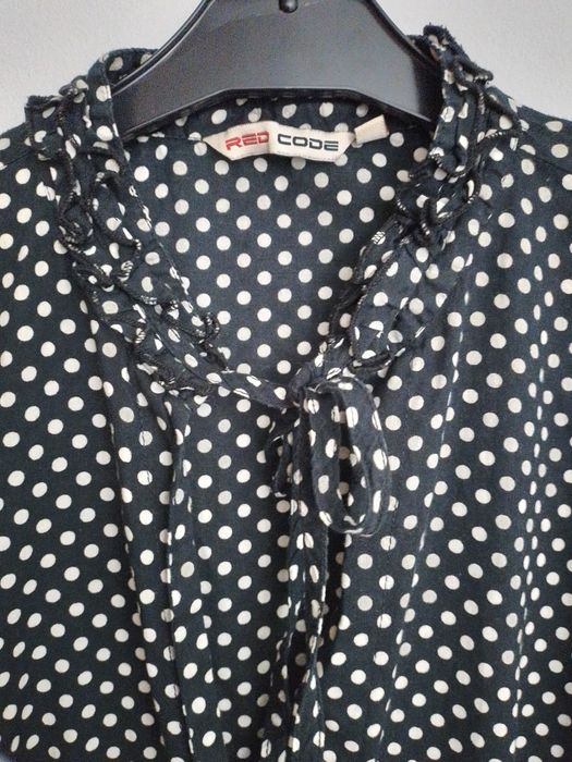 camisa Code como nova