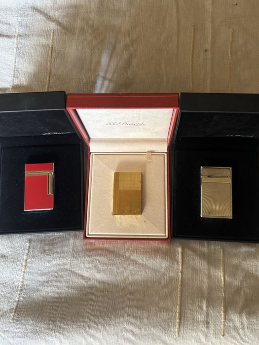 Conjunto de 2 isqueiros linha 2 sendo o encarnado raro