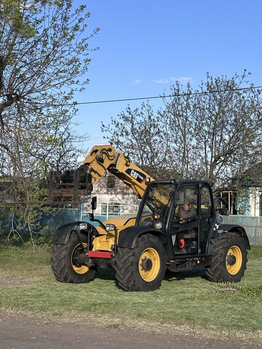 Телескопічний навантажувач JCB Manitou CAT TH 406 manitou