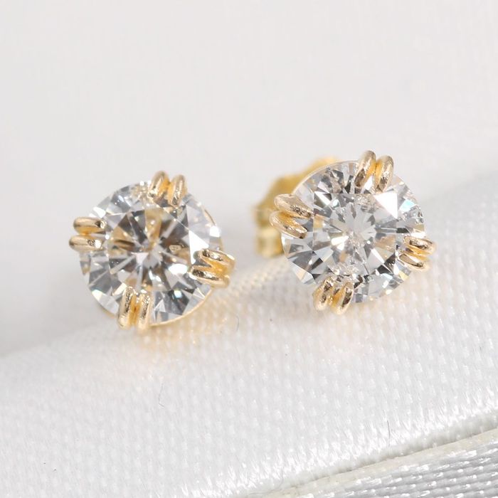 Złote kolczyki z brylantami 0.68ct 14K