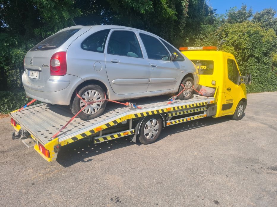 Pomoc drogowa-usługi transportowe lawetą-holowanie