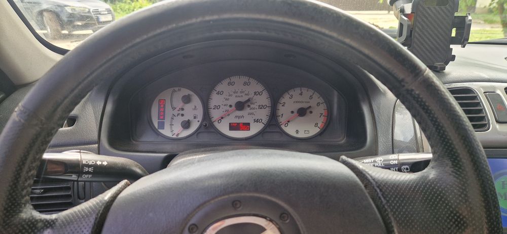 Мазда 323 Protege5 GXI