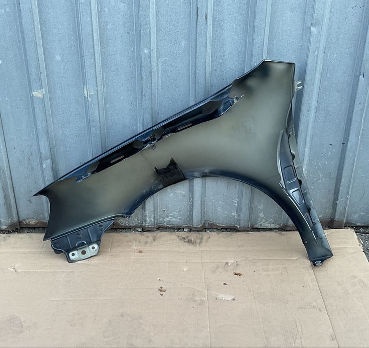 VW GOLF V 5 BŁOTNIK Prawy Przód LC5F