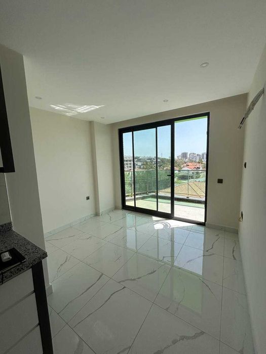 Квартира 1+1 в новом жилом комплексе в окружении сосновых лесов Турция