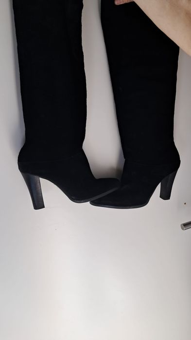 Botas de tacão e cano alto
