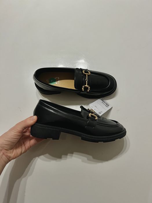 Нові туфлі лофери