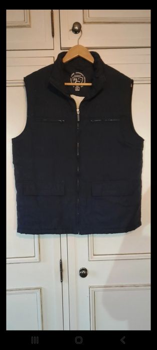 Colete com bolsos forrado