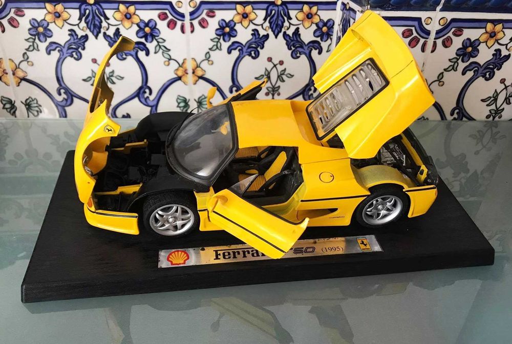 Carros metal burago coleção shell ferrari f50 1/18 miniaturas
