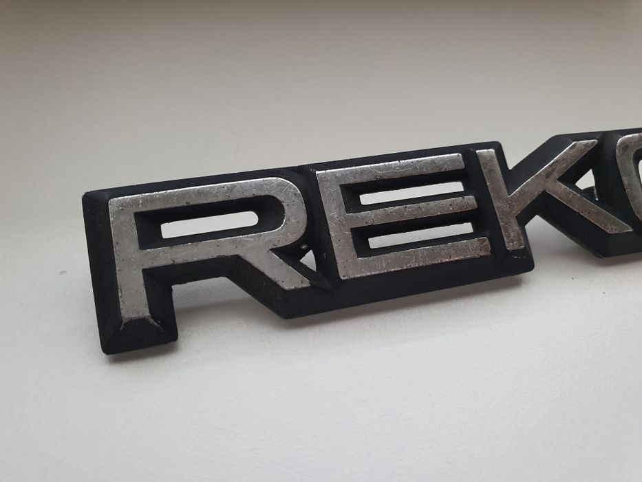 Opel Rekord emblemat napis