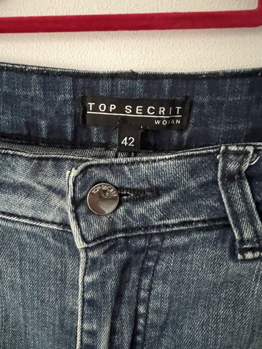 Jeansowe spodnie z postrzępieniami slim fit Top Secret roz. 42 / XL