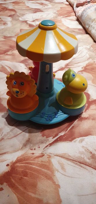 Дитяча карусель з 3ма неваляшками