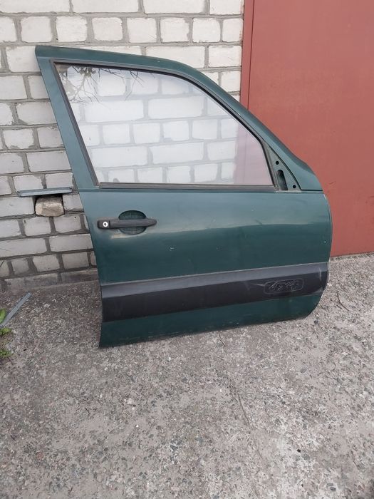 Двері нива шевроле передні і задні 2123
