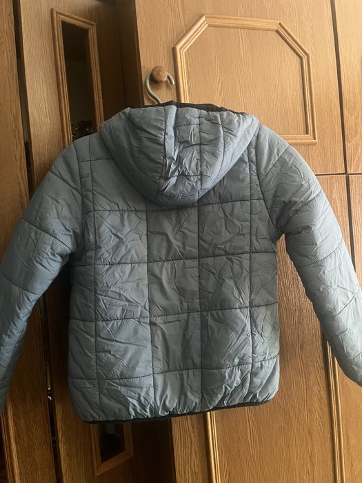 Продам куртку на хлопчика.Розмір-140-146