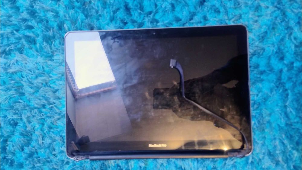 części do MacBook Pro matryca, dvd, klawiatura.
