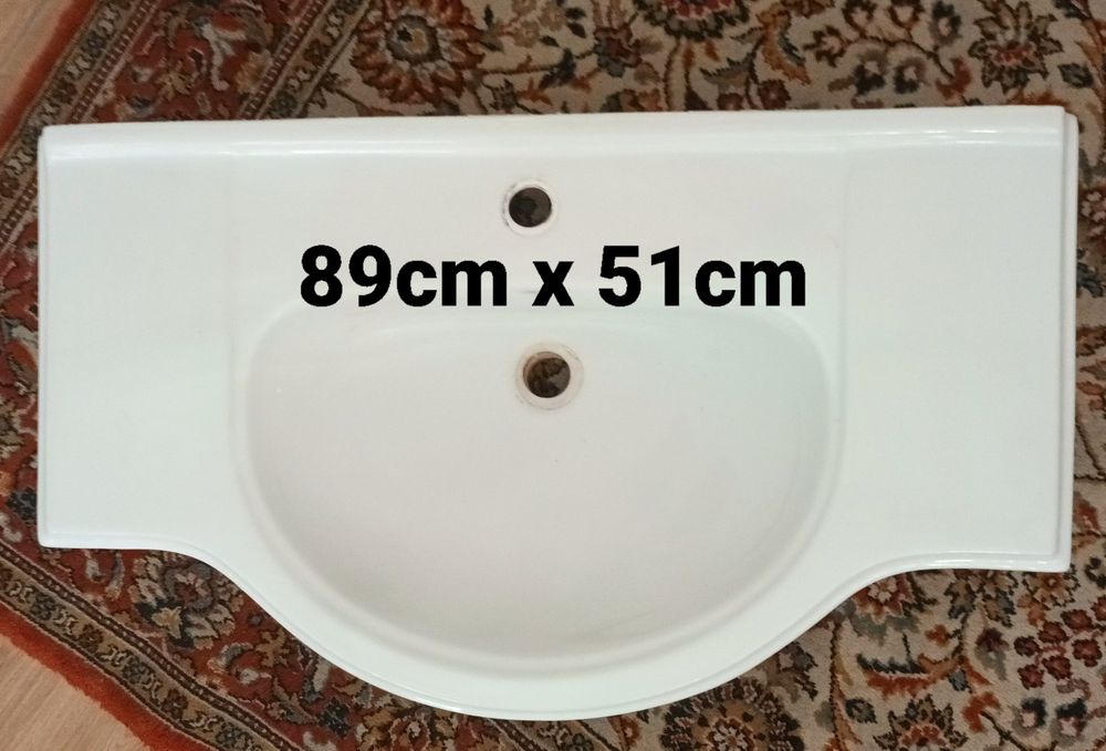 Lavatorio de ceramica com pouco uso