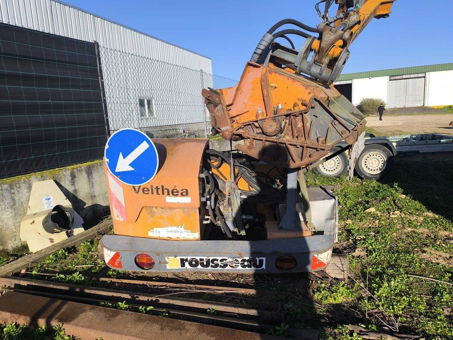 Trator de rodas Case IH JX 95 + Triturador Rousseau Velthéa