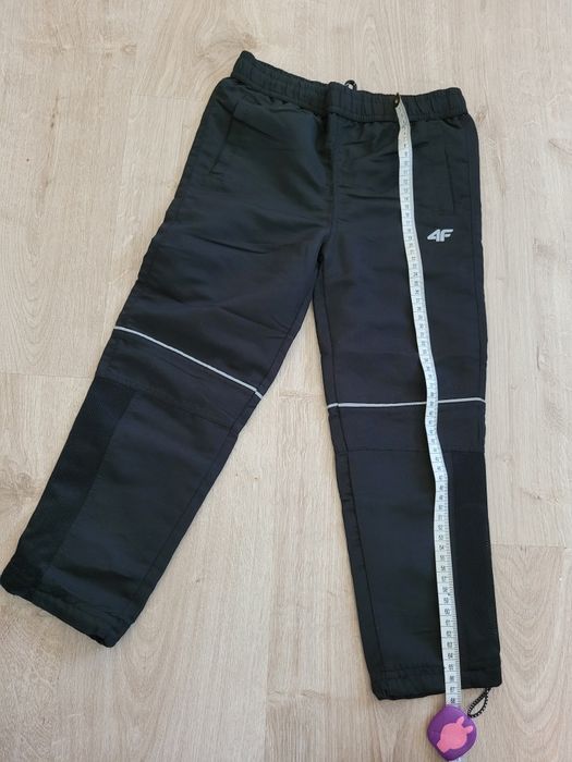 Przewiewne spodnie 4f rozmiar 116