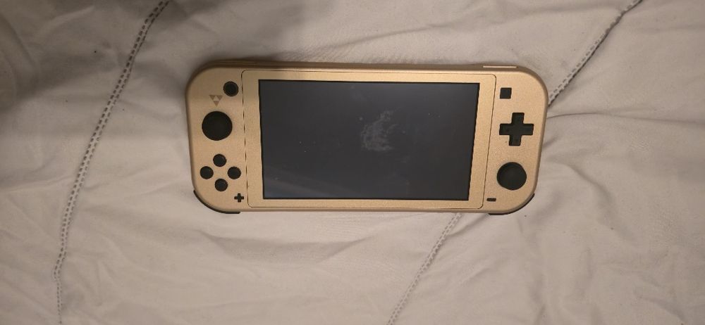 Nintendo Switch Lite Hyrule Edition + 2 Jogos  | Pokémon | Tony Hawk