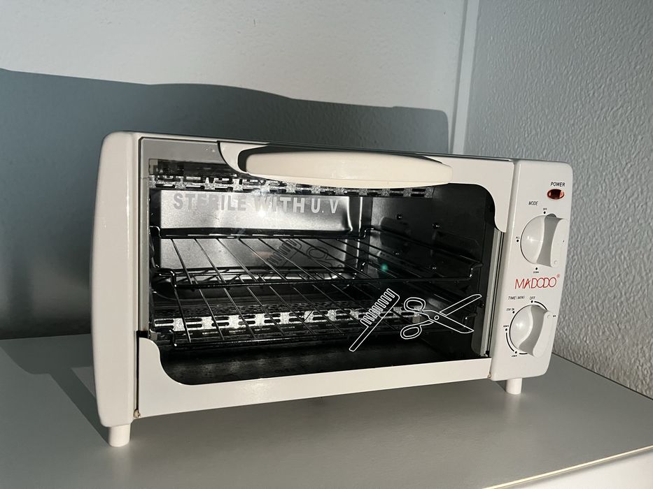 Esterilizador em bom estado com luz violeta