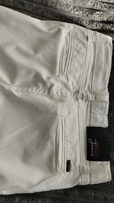 Білі штани на хлопчика 9-10 років