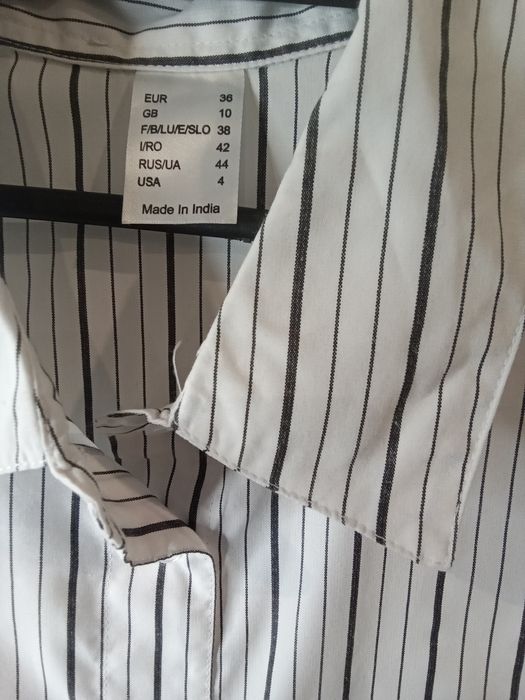 Koszula damska w paski.