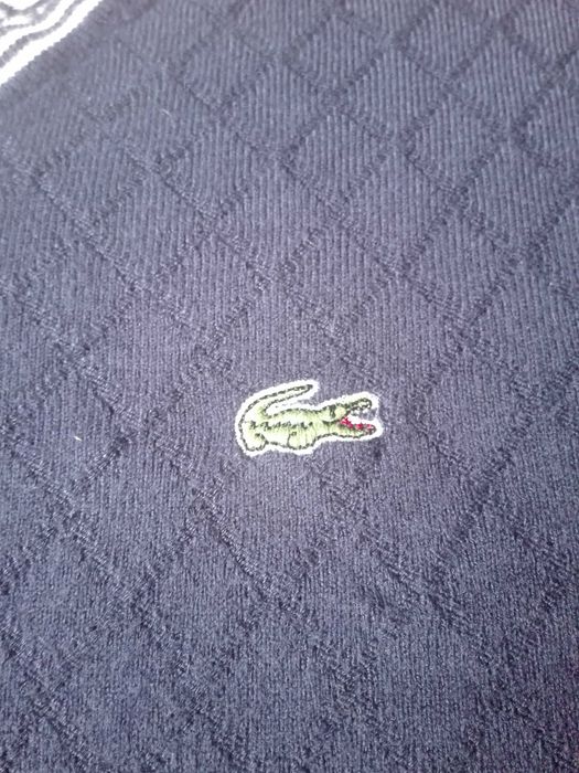 Granatowy sweterek Lacoste