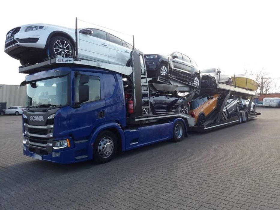 Попутний евакуатор автовоз по Україні з Європи Львів Київ ДніпроХарків