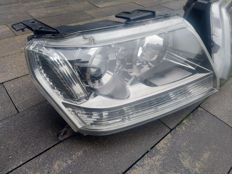 Reflektor lampa przód prawa lewa /europa/ Suzuki Grand Vitara II 2