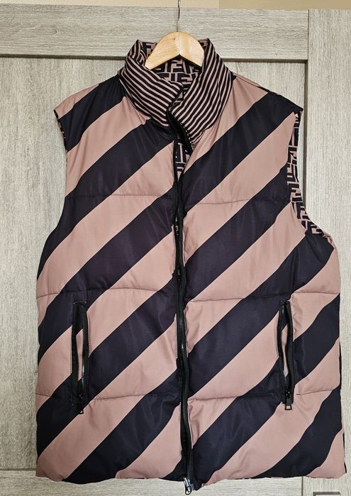 Жіноча двостороння жилетка