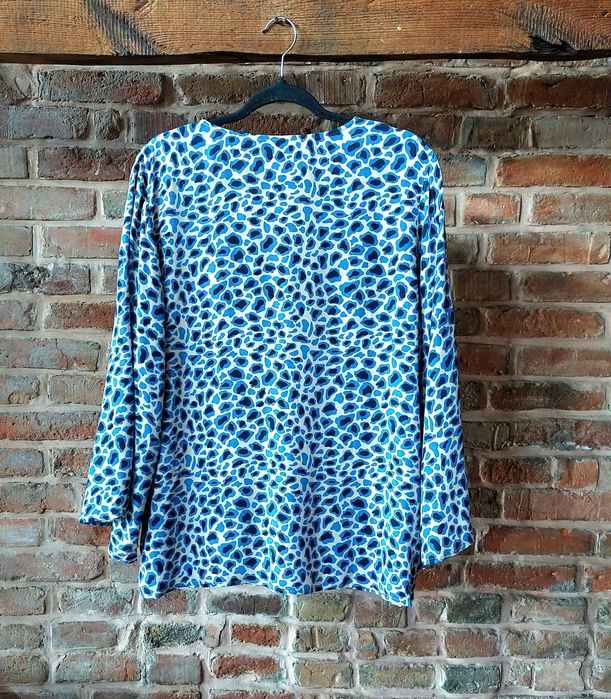 Bluzka o kroju oversize 38/40/42 z rozszerzanymi rękawami