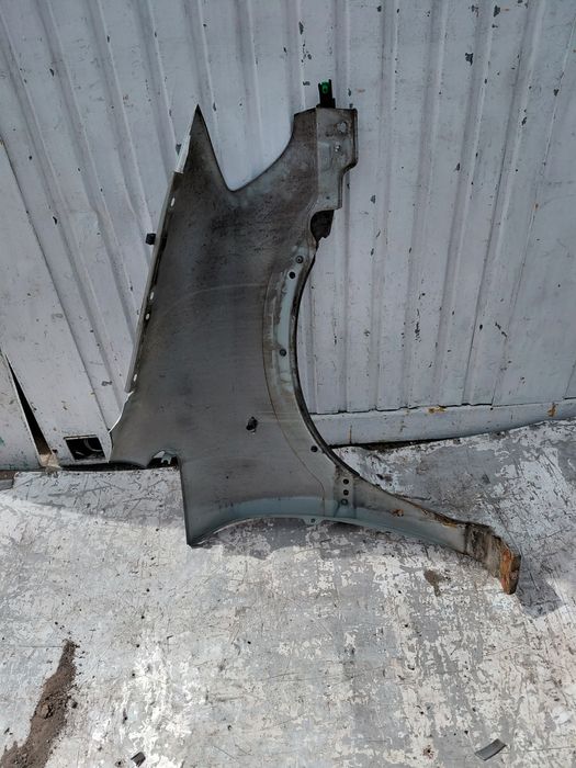 Błotnik Opel Zafira A Z147 lewy przód