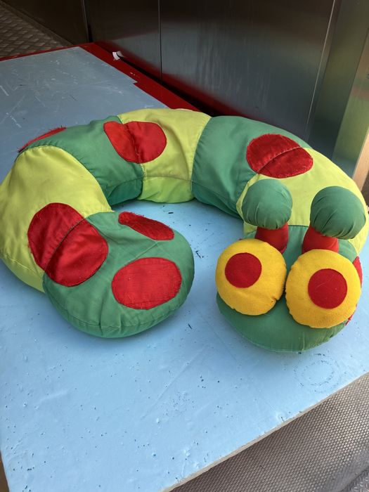 Protetor de acento em forma de lagarta