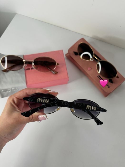 Сонцезахисні окуляри міу міу miu miu