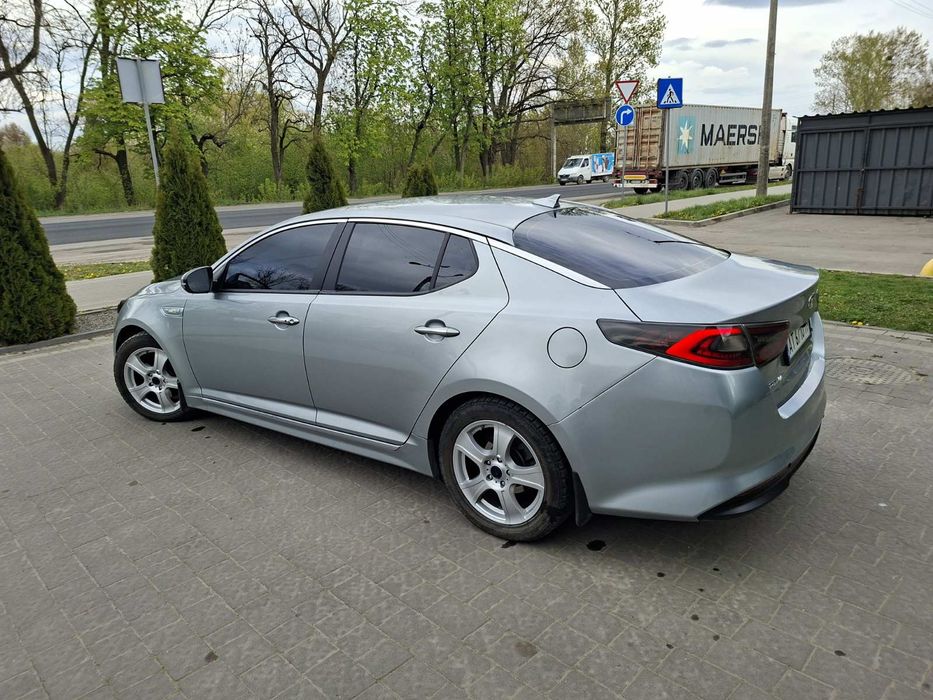 Киа оптима гібрид 2014