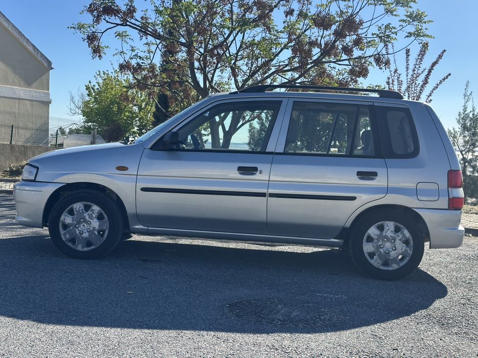 Mazda Demio 1.3 Glx de 1999 a gás