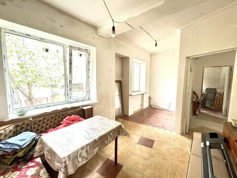 Продам полдома в районе завода Шевченко  со своим двором