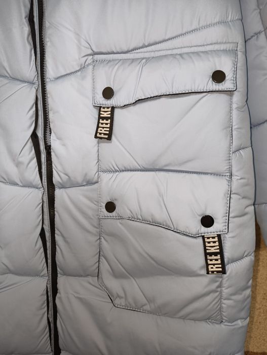 Пуховик зимовий новий