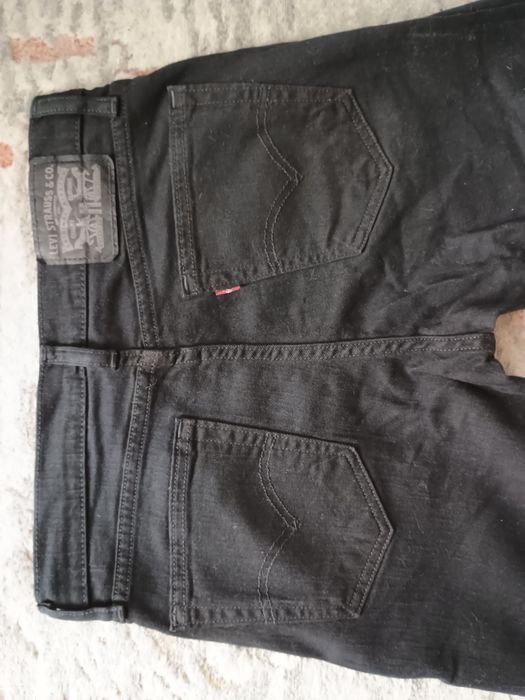 Fajne czarne klasyczne mięciutkie LEVIS,y W 30 L 32 pas 78cm