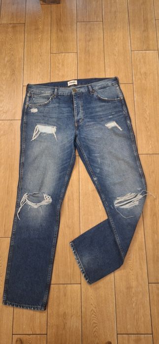 Spodnie jeansy Wrangler z przetarciami