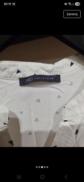 Biała bluzka na guziki w trójkąty