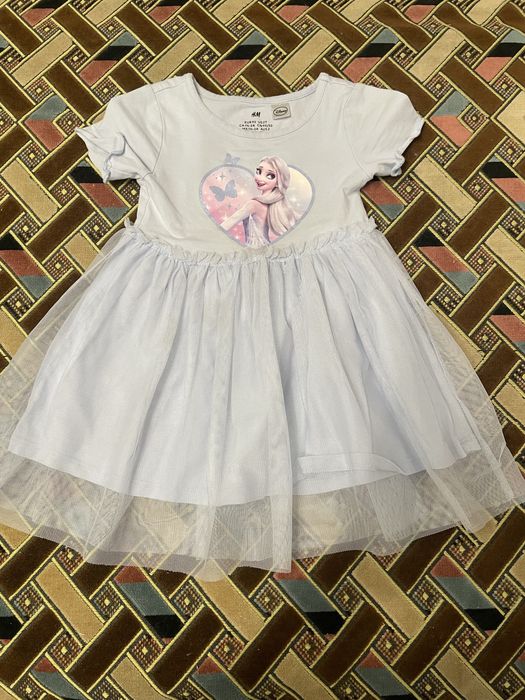 Ніжна блакитна сукня з коротким рукавом на дівчинку