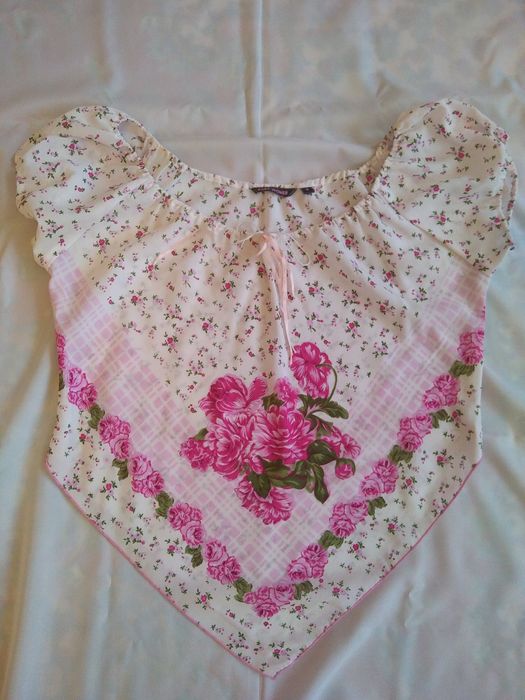 Жіночі блузки з коротким рукавом та без рукавів