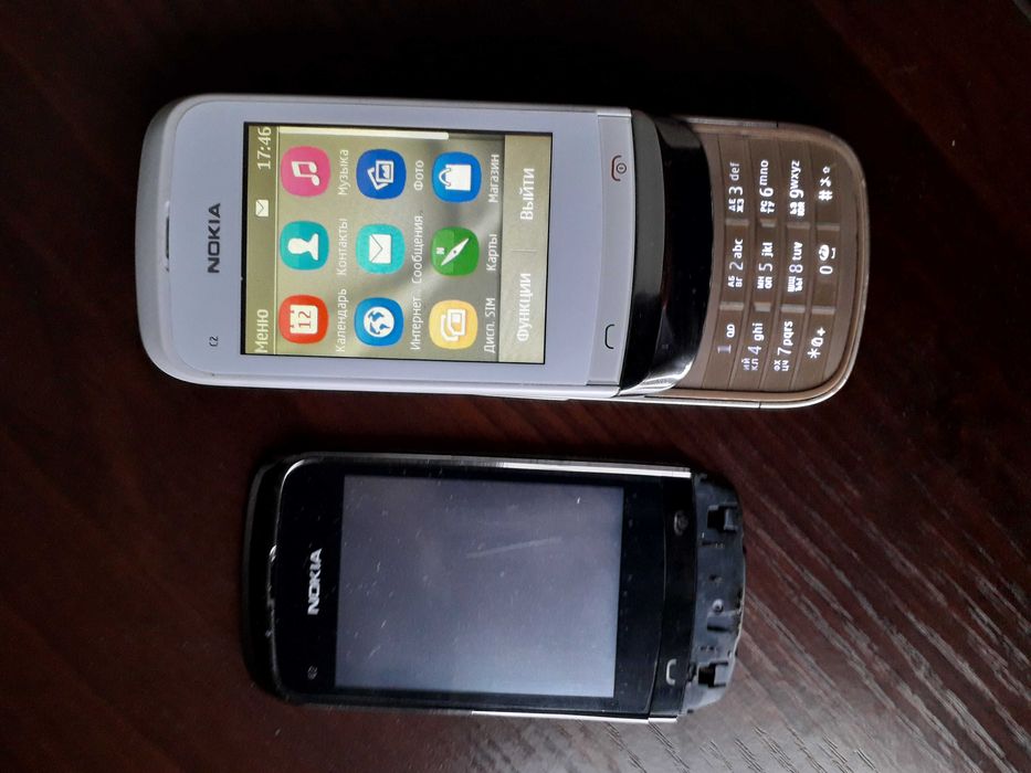 Мобільний телефон NOKIA C2-06 + подарок кнопочний телефон SANYO.