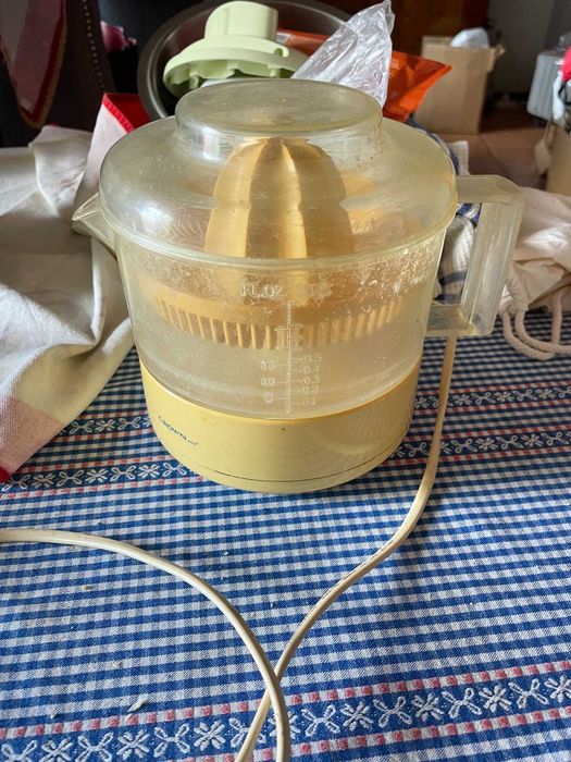 máquina de fazer sumo de laranja